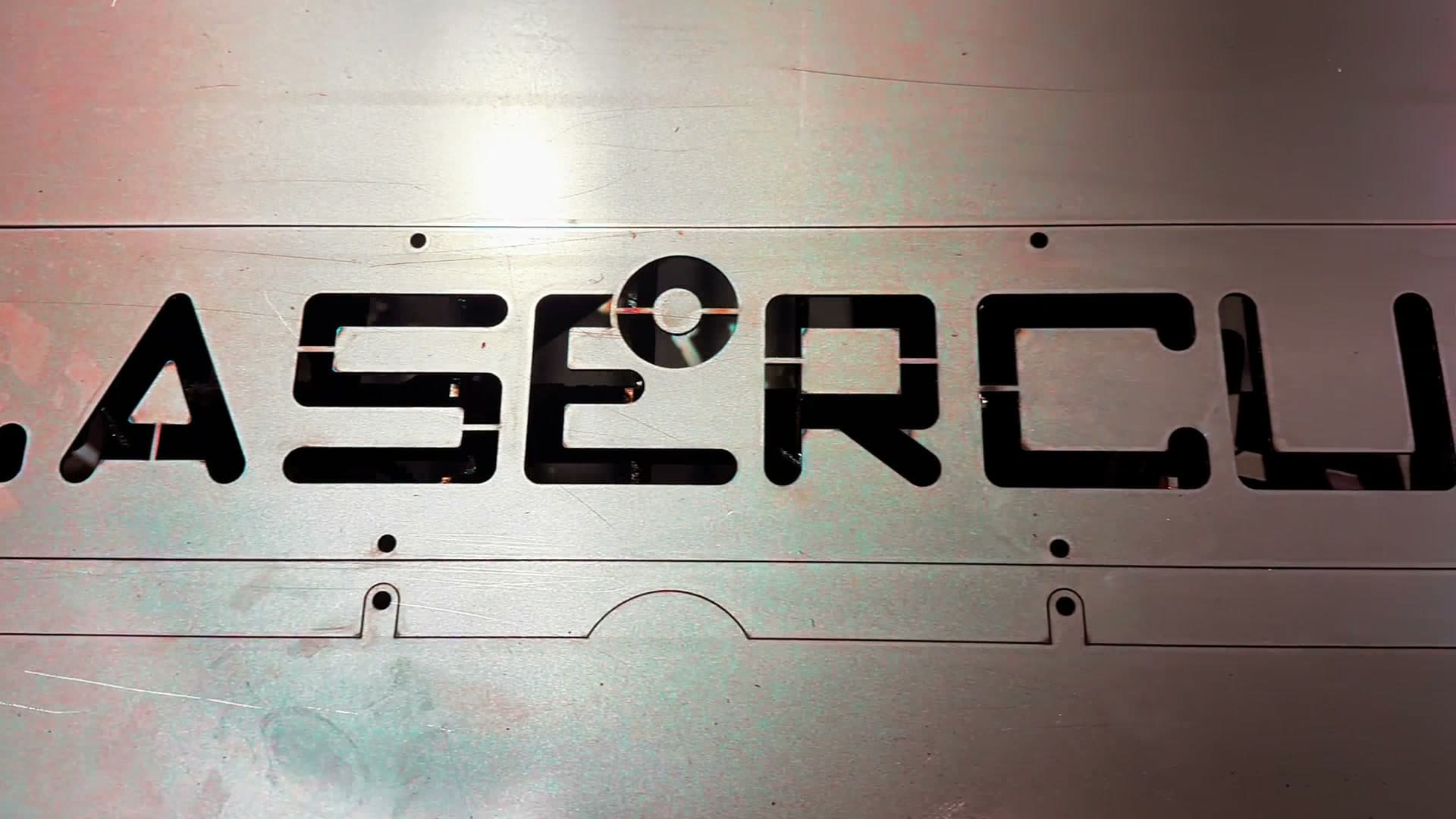 Laser engraving and marking of metal parts — logos, text, serial numbers, and QR codes